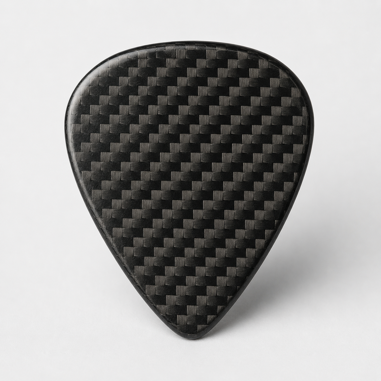 Carbon fiber composite guitar pick